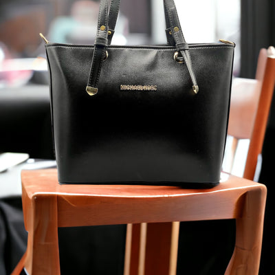 michael kros black hand bag